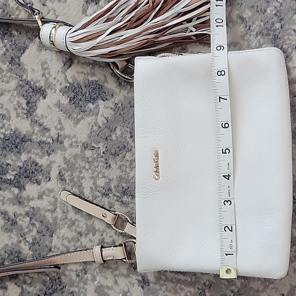 Calvin Klein Tan and White Crossbody Bag with Sleek Design - Picture 8 of 13